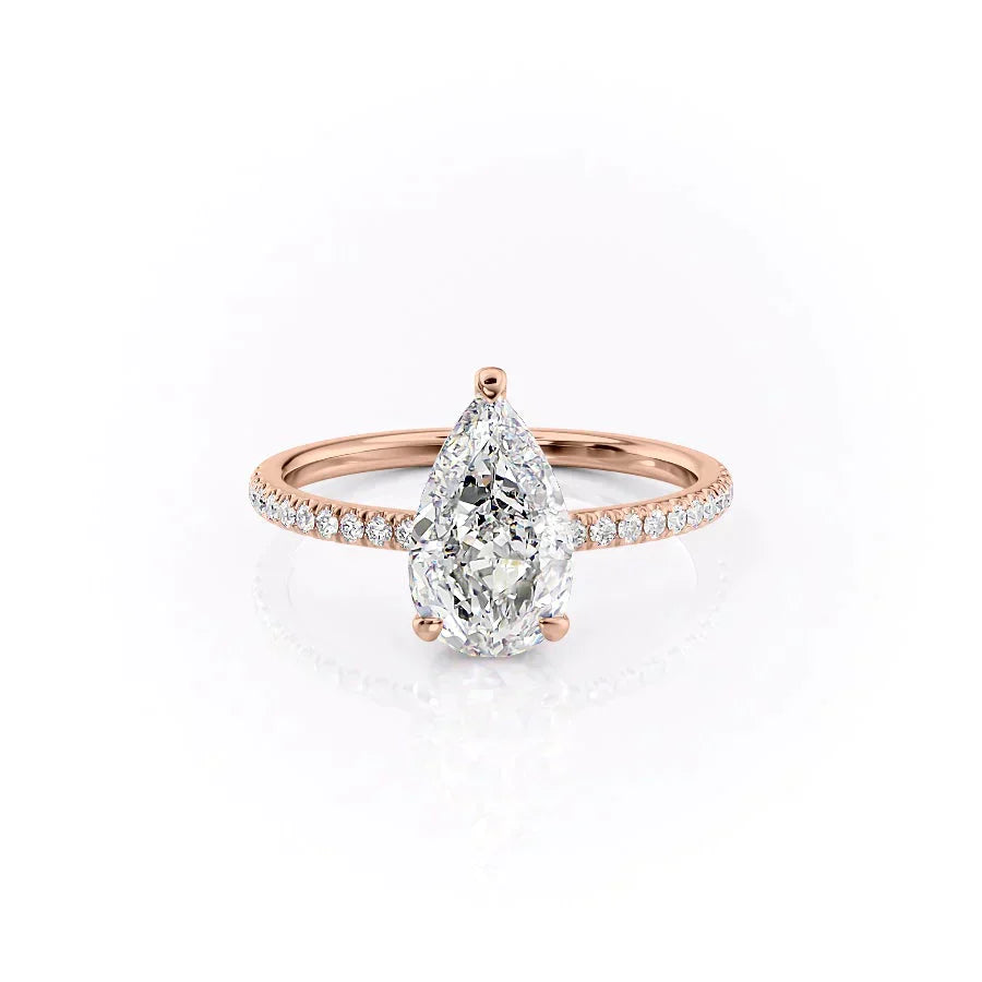 The Pave Aline Set With A 1.5 Carat Pear Moissanite