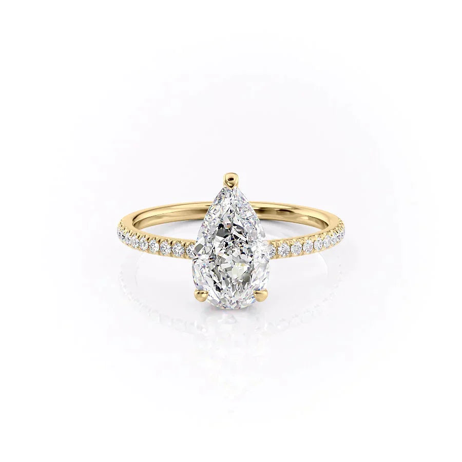 The Pave Aline Set With A 1.5 Carat Pear Moissanite