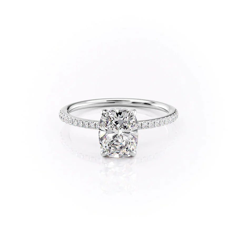 The Pave Kamellie Set With A 1.5 Carat Elongated Cushion Moissanite