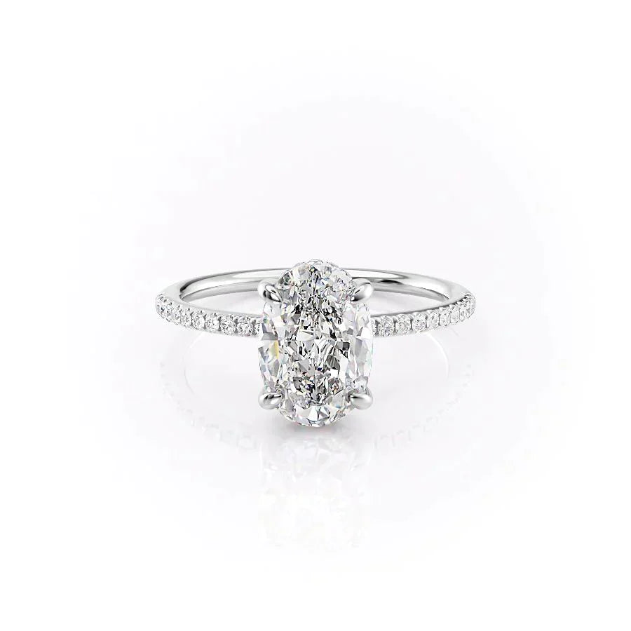 The Pave Kamellie Set With A 1.5 Carat Oval Moissanite