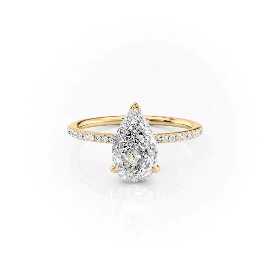 The Pave Kamellie Set With A 2.5 Carat Pear Moissanite