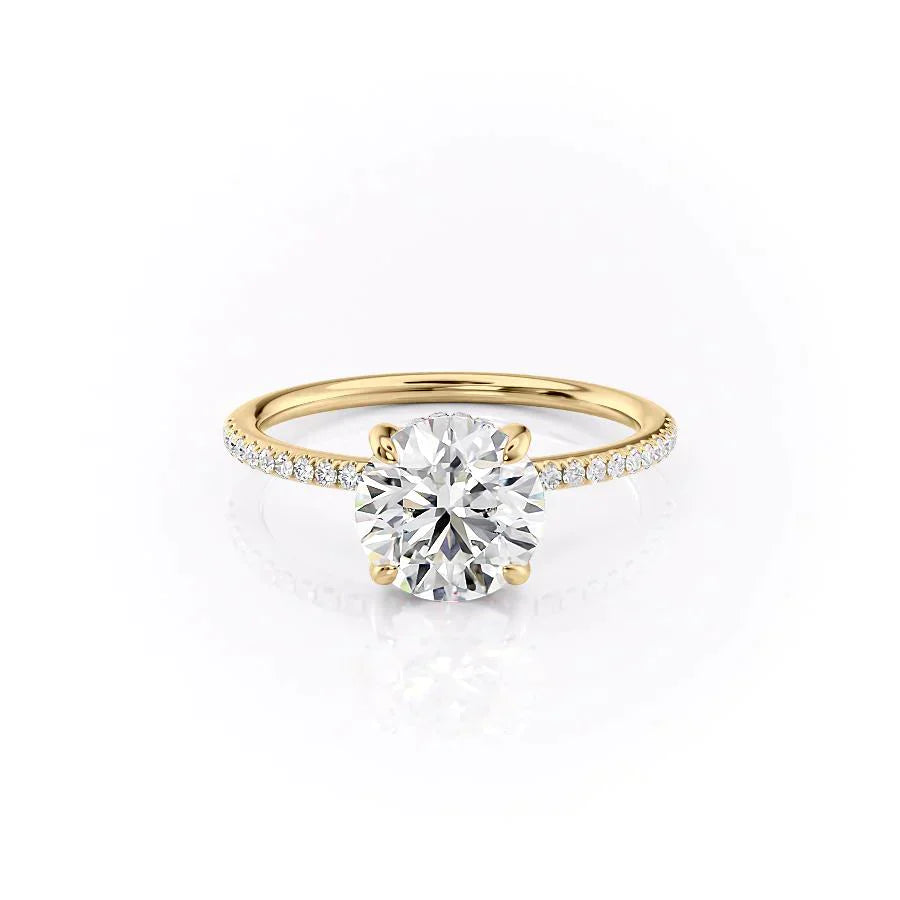 The Pave Kamellie Set With A 4.5 Carat Round Moissanite