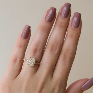 The Penelope Set With A 2.5 Carat Elongated Cushion Moissanite