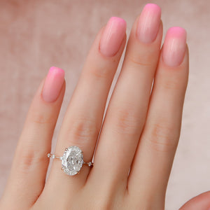 The Penelope Set With A 1 Carat Oval Lab Diamond