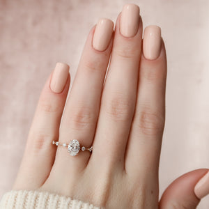 The Penelope Set With A 1 Carat Oval Lab Diamond