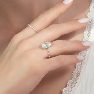 The Penelope Set With A 2 Carat Oval Lab Diamond