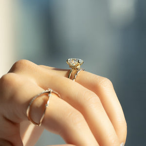 The Nelly Set With A 2.5 Carat Elongated Cushion Moissanite