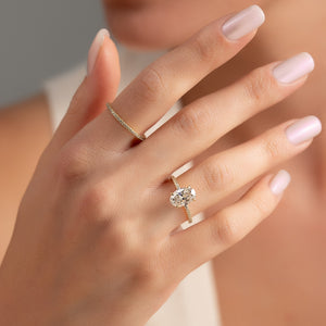 The Pave Nelly Set With A 2 Carat Oval Lab Diamond