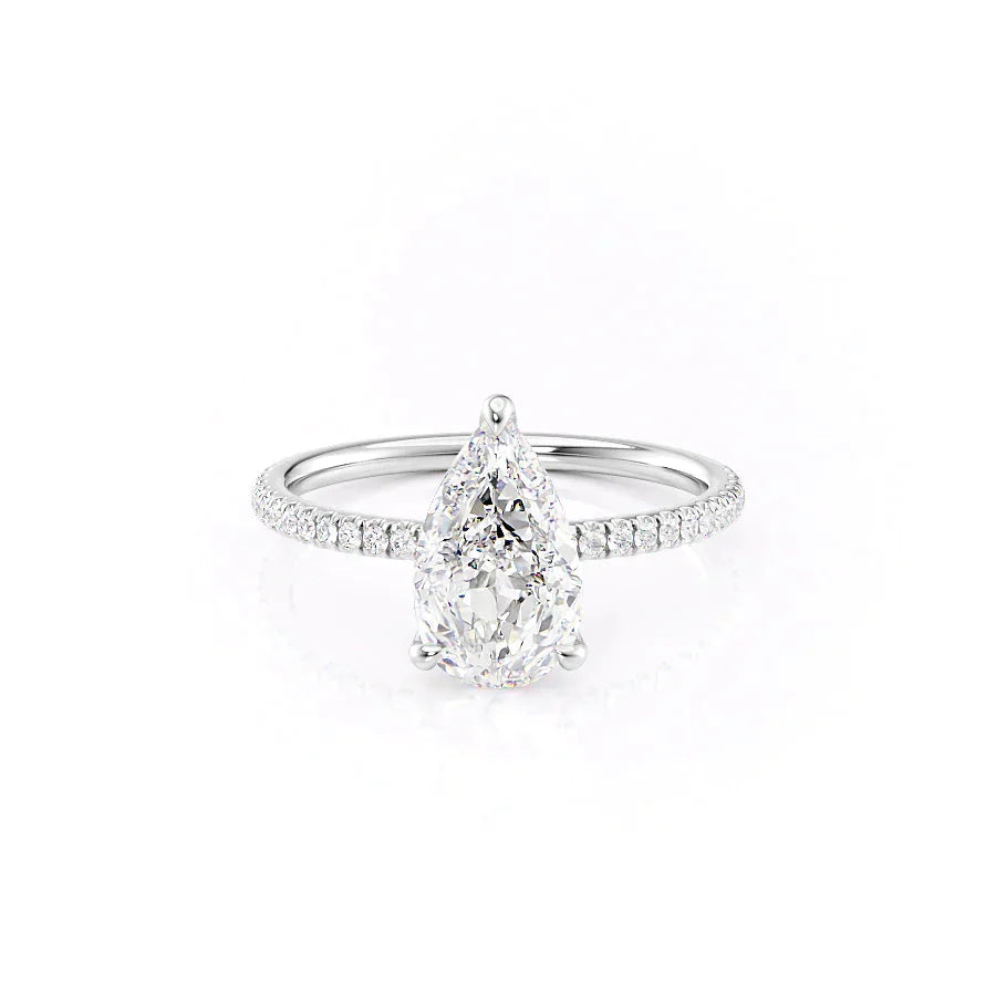 The Pave Nelly Set With A 1.5 Carat Pear Moissanite