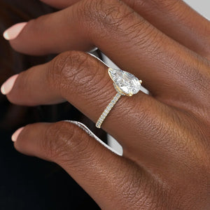The Pave Nelly Set With A 1.5 Carat Pear Lab Diamond