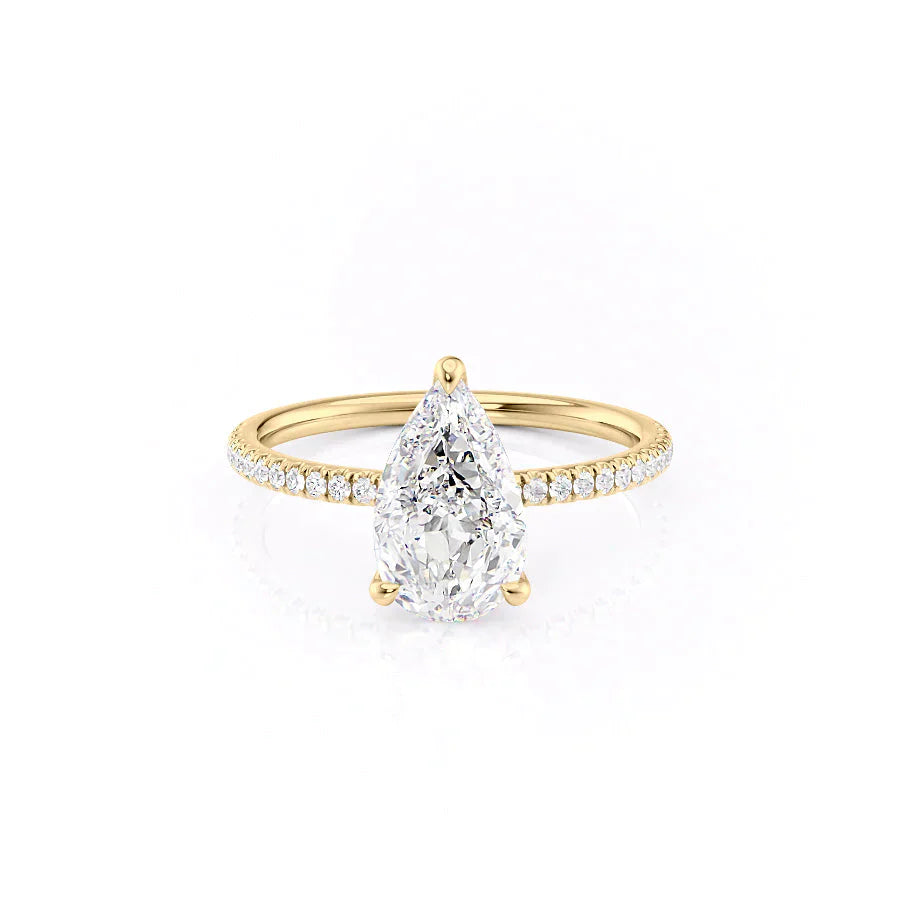 The Pave Nelly Set With A 1.5 Carat Pear Moissanite