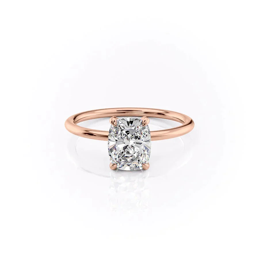 The Crown Kamellie Set With A 1.5 Carat Elongated Cushion Moissanite