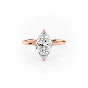 The Crown Kamellie Set With A 1.5 Carat Marquise Lab Diamond