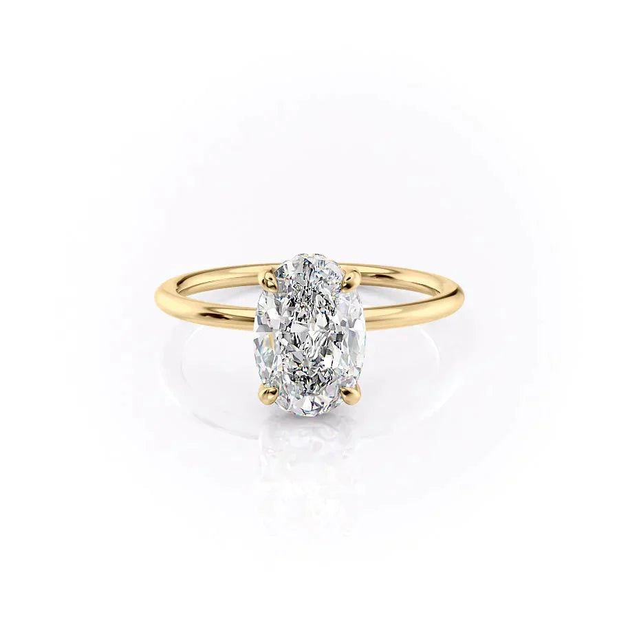 The Crown Kamellie Set With A 1.5 Carat Oval Moissanite