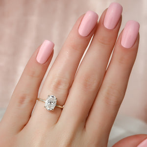 The Crown Kamellie Set With A 1 Carat Oval Lab Diamond