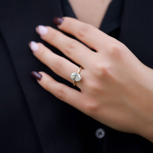 The Crown Kamellie Set With A 1 Carat Oval Lab Diamond