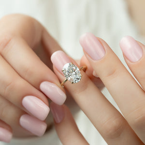 The Crown Kamellie Set With A 2 Carat Oval Lab Diamond
