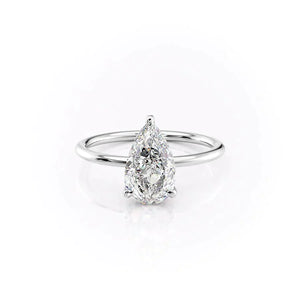 The Crown Kamellie Set With A 1.5 Carat Pear Moissanite