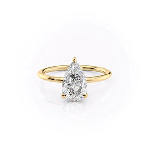 The Crown Kamellie Set With A 1.5 Carat Pear Moissanite