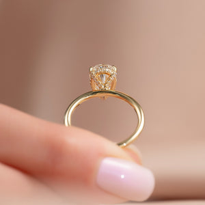 The Crown Kamellie Set With A 2.5 Carat Pear Moissanite