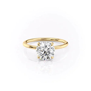 The Crown Kamellie Set With A 1.5 Carat Round Moissanite