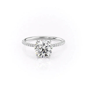 The Pave Crown Kamellie Set With A Round Moissanite