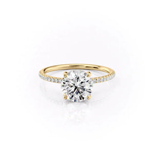 The Pave Crown Kamellie Set With A 1.5 Carat Round Moissanite