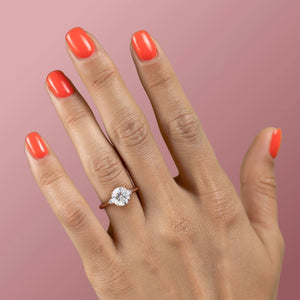 The Pears Liv Set With A 1.5 Carat Round Moissanite