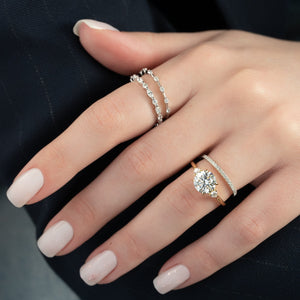 The Pave Lia Set With A 2.5 Carat Round Moissanite