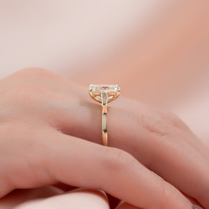 The Liv Set With A 2.5 Carat Elongated Cushion Moissanite