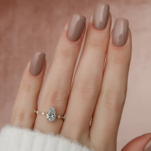 The Penelope Set With A 4.5 Carat Pear Moissanite
