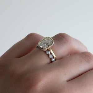 The Charlotte Set With A 2.5 Carat Elongated Cushion Moissanite