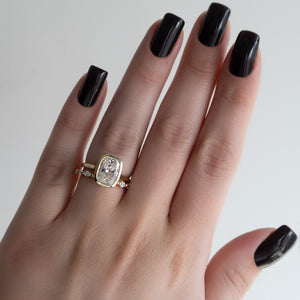 The Charlotte Set With A 2.5 Carat Elongated Cushion Moissanite