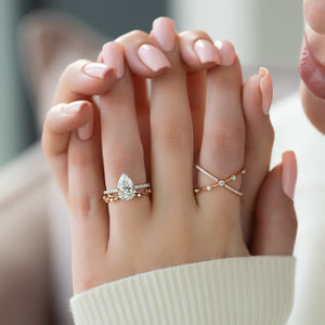 The Pave Alex Set With A 2.5 Carat Pear Lab Diamond