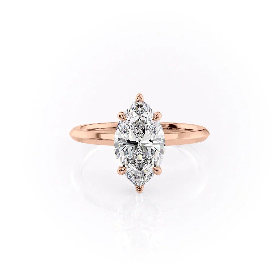 The Razor Kamellie Set With A 1.5 Carat Marquise Moissanite