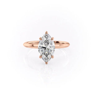 The Razor Kamellie Set With A Marquise Moissanite