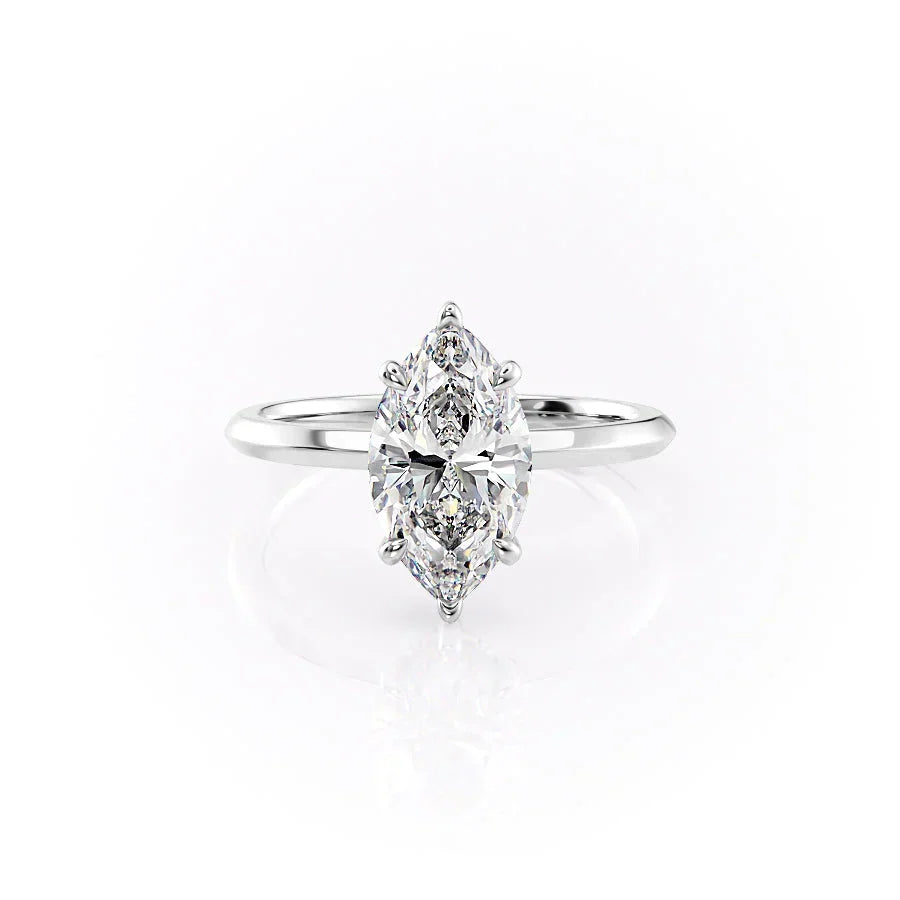 The Razor Kamellie Set With A Marquise Moissanite