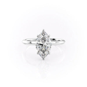 The Razor Kamellie Set With A Marquise Moissanite