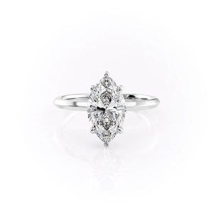 The Razor Kamellie Set With A 1.5 Carat Marquise Moissanite