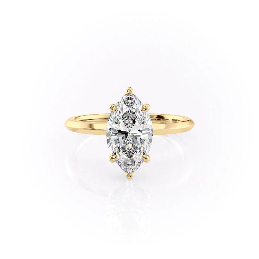 The Razor Kamellie Set With A 1.5 Carat Marquise Moissanite