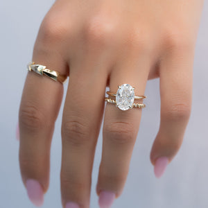 The Razor Kamellie Set With A 2 Carat Oval Lab Diamond