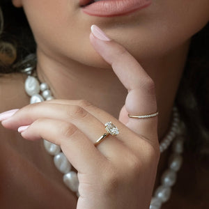 The Razor Kamellie Set With A 2 Carat Oval Lab Diamond