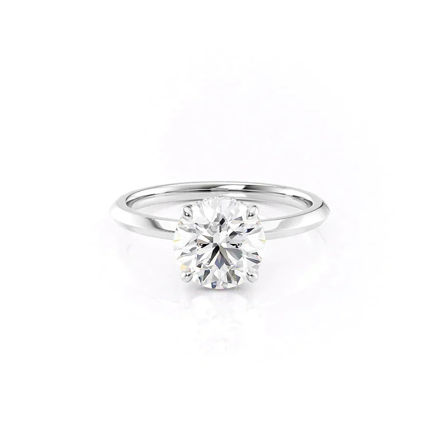 The Razor Kamellie Set With A Round Moissanite