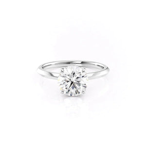 The Razor Kamellie Set With A Round Moissanite