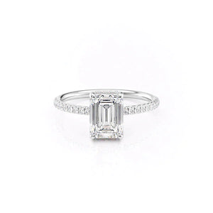 The Low Profile Kamellie Set With A Emerald Moissanite