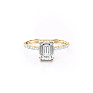 The Low Profile Kamellie Set With A Emerald Moissanite