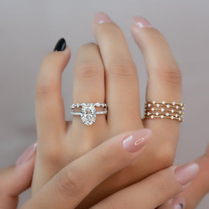 The Low Profile Kamellie Set With A 2 Carat Oval Lab Diamond