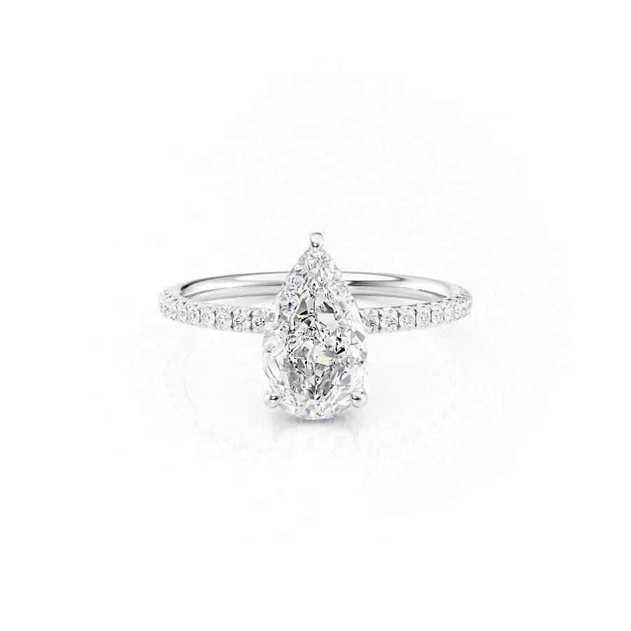 The Low Profile Kamellie Set With A 1.5 Carat Pear Moissanite