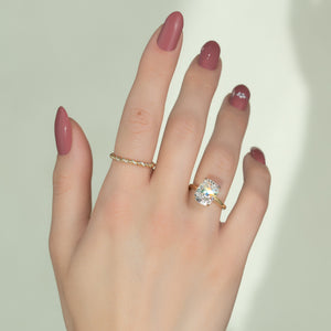 The Alex Set With A 2.5 Carat Elongated Cushion Moissanite