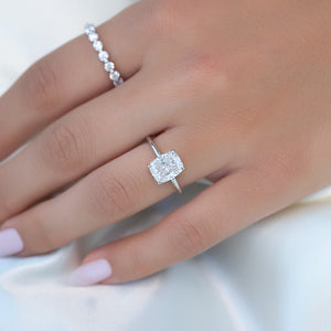 The Low Profile Kamellie Set With A 2.5 Carat Elongated Cushion Moissanite